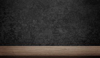 wooden table at foreground with aged grunge black rusted metal texture at background for product displayed in rustic mood. oak wooden table with grey rust and oxidized metal background.