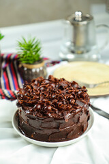 Chocolate Fudge Cake served on food table top view cafe bake dessert