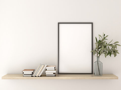 Fototapeta Mockup a poster picture frame in Interior living room design, modern minimalist style. wooden shelves, books, notebooks, flower vases. white walls. 3D render