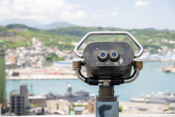 Tourist binocular view of the city in Keelung of Taiwan