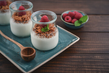 Dessert panna cotta with caramel cheese and fresh raspberry