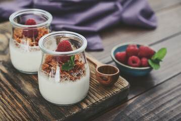 Dessert panna cotta with caramel cheese and fresh raspberry