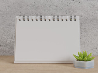 Blank Ladscape desk calendar on table with vase decoration, front view. for mockup design