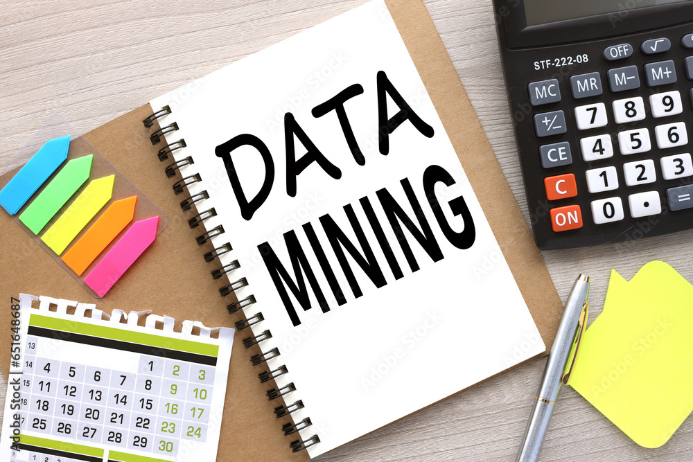 Poster data mining open notebook with stickers and a calendar for the month. word on the page
