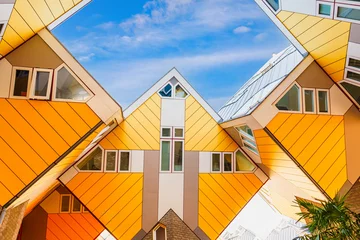 Wandaufkleber Spectacular Urban Landscape, Vibrant Yellow Cube Houses in Rotterdam, a Modern Architectural Marvel and Tourist Attraction in the Netherlands © Ilja