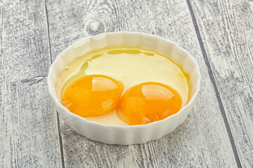 Chicken egg in the bowl