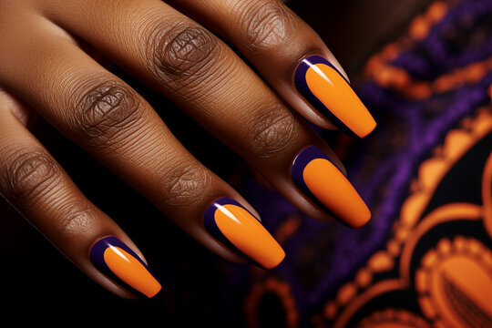 perfect manicure nails with Halloween themed purple and orange nail polish, nail salon advertisement, black woman