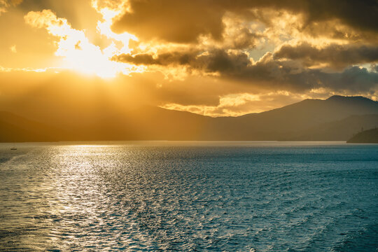 sunset on the sea with a sailboat