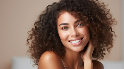 A close-up shot of a smiling woman confidently looking into the camera, radiating self-assured beauty.