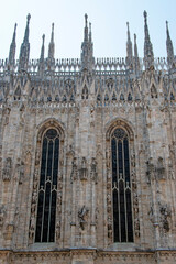 Detail of the Milan Cathedral, ancient cathedral church in the center of Milan, Italy, Europe - 651686292