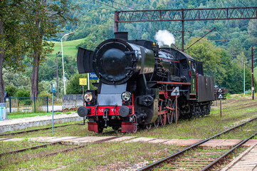Fototapeta premium Old steam train Poprad Valley , Żegiestów Poland. EU
