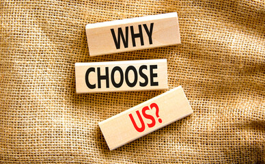 Why choose us symbol. Concept word Why choose us on beautiful wooden block. Beautiful canvas table canvas background. Business motivational why choose us concept. Copy space.