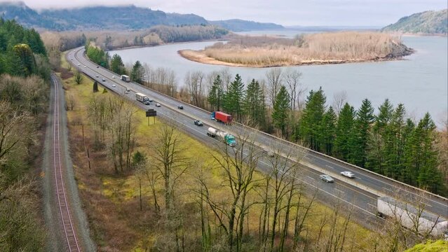 Highway Harmony: Columbia River Gorge with Mountain Views and Freeway Traffic in 4K Video