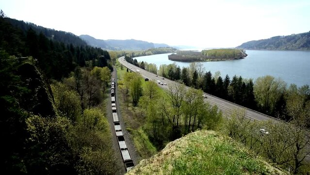 Highway Harmony: Columbia River Gorge with Mountain Views and Freeway Traffic in 4K Video