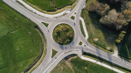 Traffic circle in Germany drone aerial view from above.