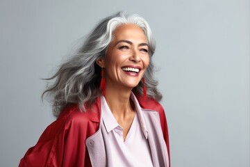 Fototapeta premium Portrait of a beautiful mid age woman with grey hair.