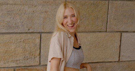 Portrait of happy teenager girl. Uniqueness in human appearance young adults. Body language plays a...