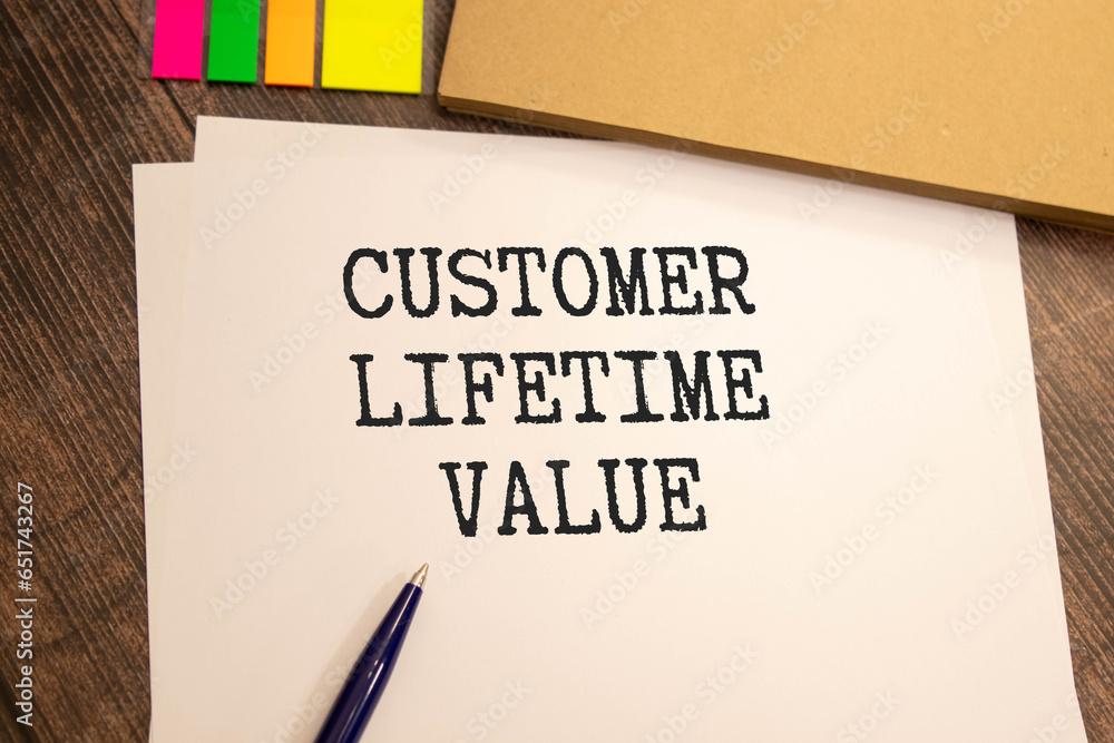 Poster customer lifetime value - handwritten text in a notebook on a desk - 3d render illustration.
