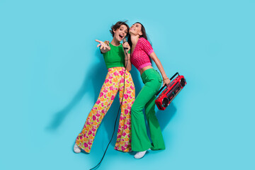 Full length body photo of vocalist solo girl with friend help with acoustic music boombox hand direct you isolated on blue color background