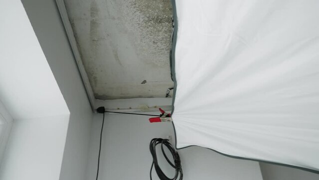 Installing and maintenance stretch ceiling in new flat. Construction of apartment