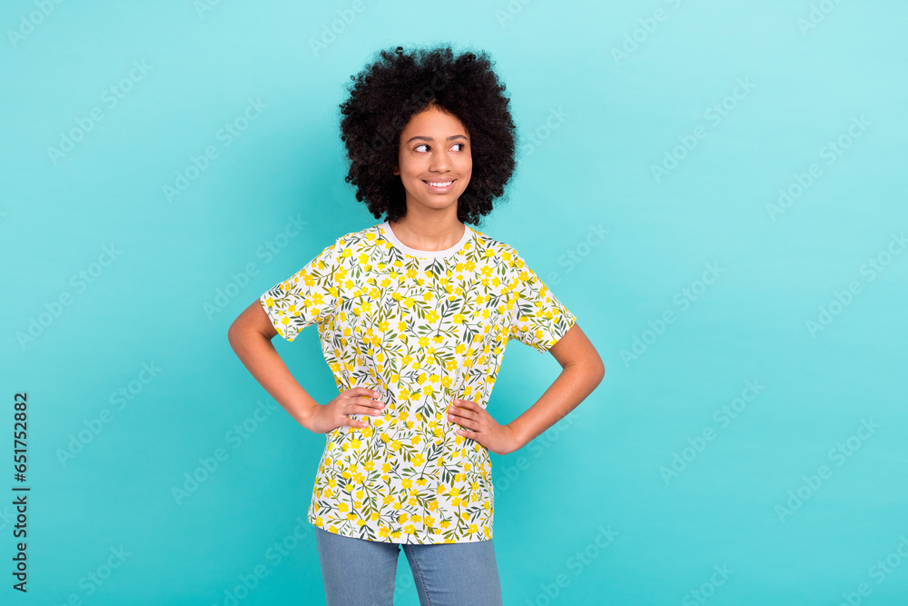 Sticker photo of cheerful cute girl wear trendy clothes hands touch waist look up empty space interesting of