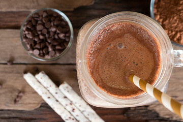  Cocoa fresh cocktail vanilla smoothies fruit juice beverage healthy the taste yummy in glass drink episode good morning on wooden background from top view.