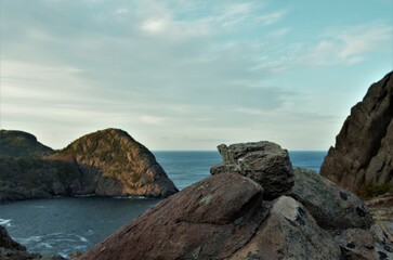 a pile of large stones on the mountain
