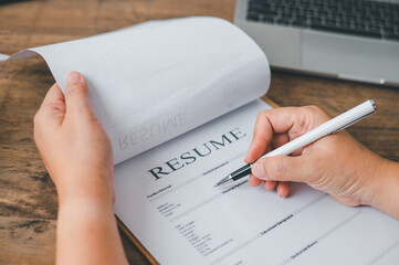 Individuals or recent grads looking for work and filling out a job application should first...