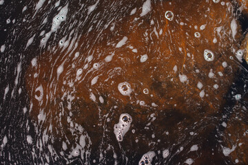 Abstract water surface with rocks and foam, copy space background image