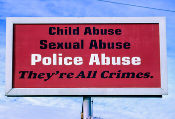 Abuse sign highlighting police abuse.