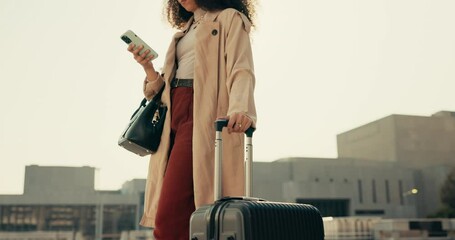 Phone, suitcase and businesswoman walking in the city for company travel or work trip meeting. Technology, luggage and closeup of professional female person networking on cellphone in urban town.