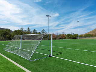 Rear angle view of soccer goal looking down field