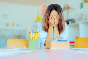Unhappy Preschool Teacher Feeling Tired and Overwhelmed. Kindergarten educator suffering from...