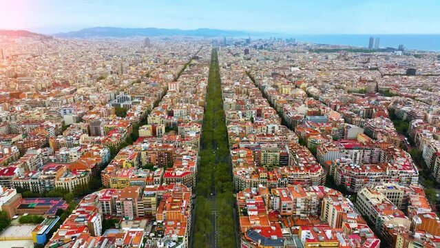 Aerial view of Barcelona Eixample district and Sagrada Familia Basilica, Spain. Barcelona street. Typical square quarters of Barcelona. Aerial view. Famous mediterranean destination in catalonia spain