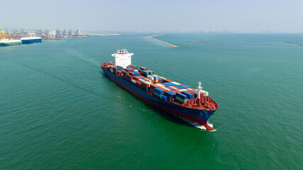 cargo container ship carrying in sea import export goods and distributing products to dealer...