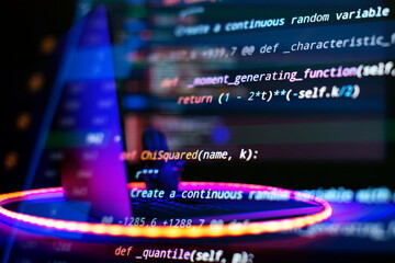 SEO optimization. Modern tech. PHP syntax highlighted. Writing programming functions on laptop. Big data and Internet of things trend.