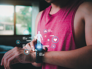 Mid adult man using smart watch during training. Heart monitor beats with wristwatch. smart watch or future data on healthcare. technology in use of smart watch for health condition.