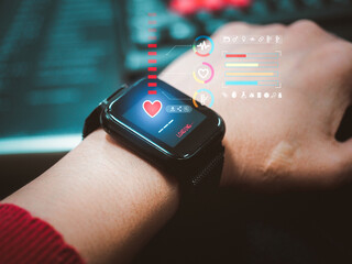 woman using smart watch during training. Heart monitor beats with wristwatch. smart watch or future data on healthcare. - obrazy, fototapety, plakaty