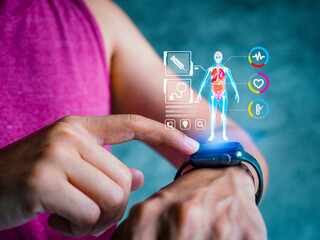 Mid adult man using smart watch during training. Heart monitor beats with wristwatch. smart watch...