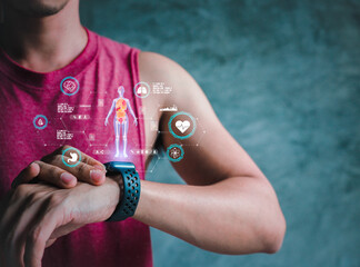 Mid adult man using smart watch during training. Heart monitor beats with wristwatch. smart watch...