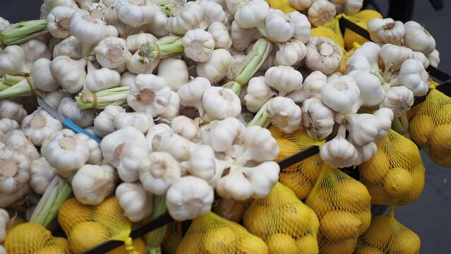  garlic and lemon selling at local market 