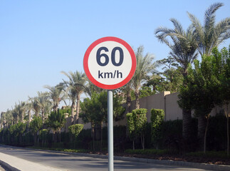 60 KM Speed limit sign a highway, sixty kilometers per hour traffic road sign, a restriction sign...