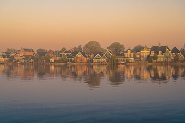 Zaandijk, Netherlands. Panorama of traditional dutch houses at the Zaan river in Zaandijk, Netherlands.
