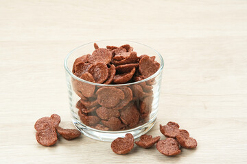 Bowl of cereal chocolate flavor, sweet crunchy 
