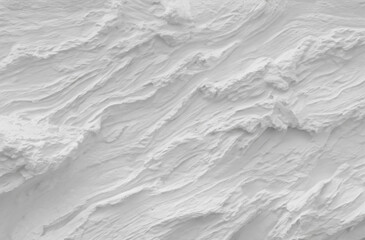 Fototapeta premium A detailed close-up photograph captures the rough, three-dimensional texture of a white plaster or stucco wall surface, featuring an abstract and organic relief pattern created by trowel marks.