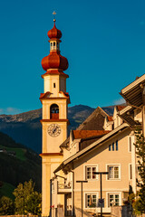 Fototapeta na wymiar Church on a sunny summer day at St Johann, San Giovanni, Ahrntal valley, Pustertal, Trentino, Bozen, South Tyrol