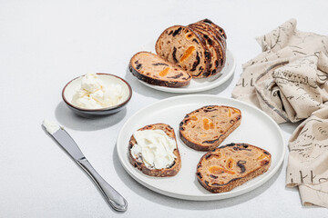 Sweet bread with raisins, dried apricots, dates, figs. Healthy ingredient for sandwiches, breakfast