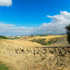 Beautiful hilly landscape late summer, plowed fields