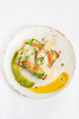 toast with poached egg and sauce