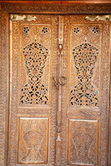 yeah wooden door with a Hello multiple beautiful beautiful carvings